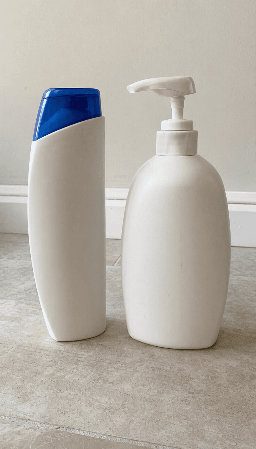 Generic shampoo and pump bottle photographed at home before cleanup